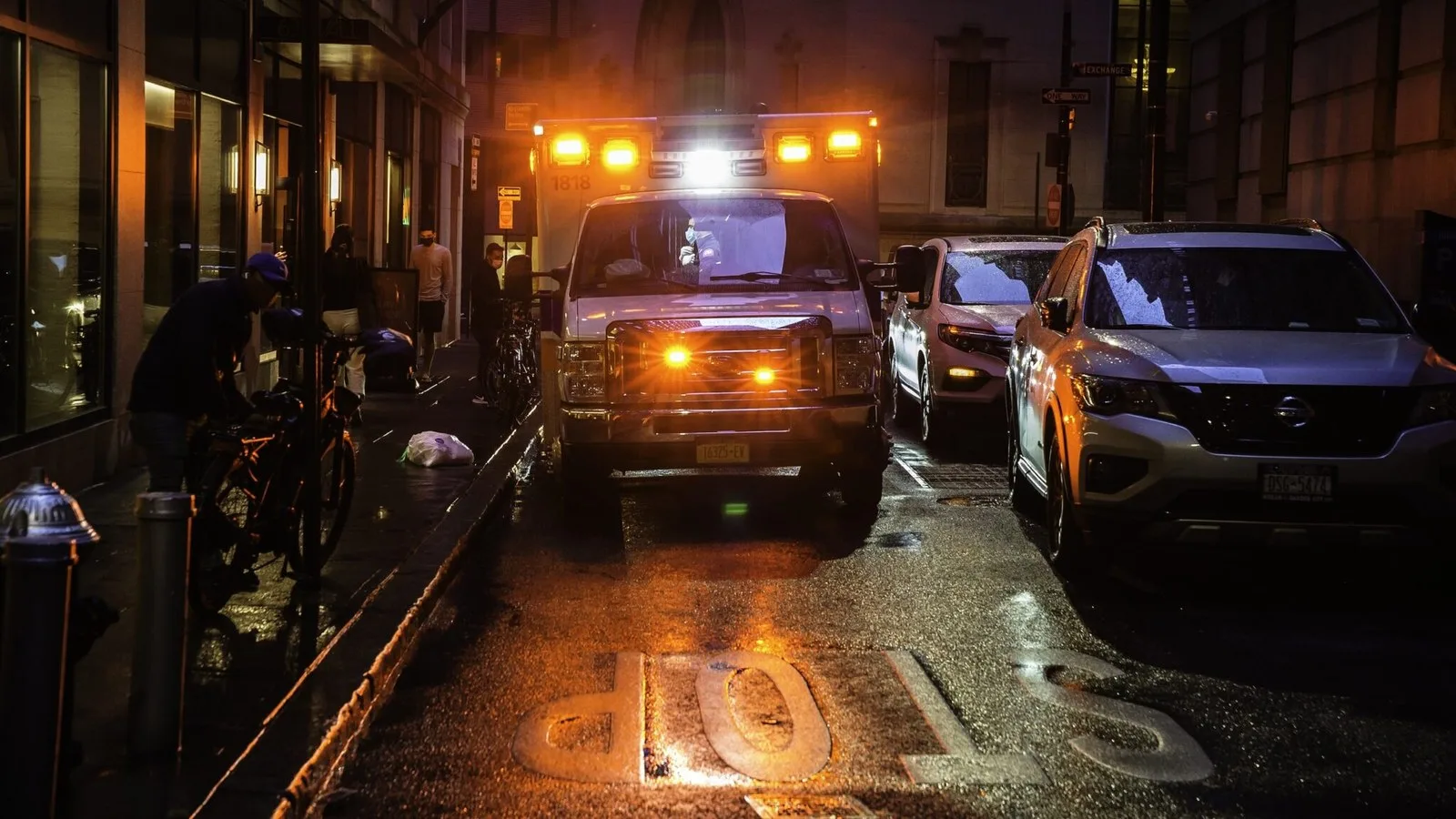 ambulance on city street at night