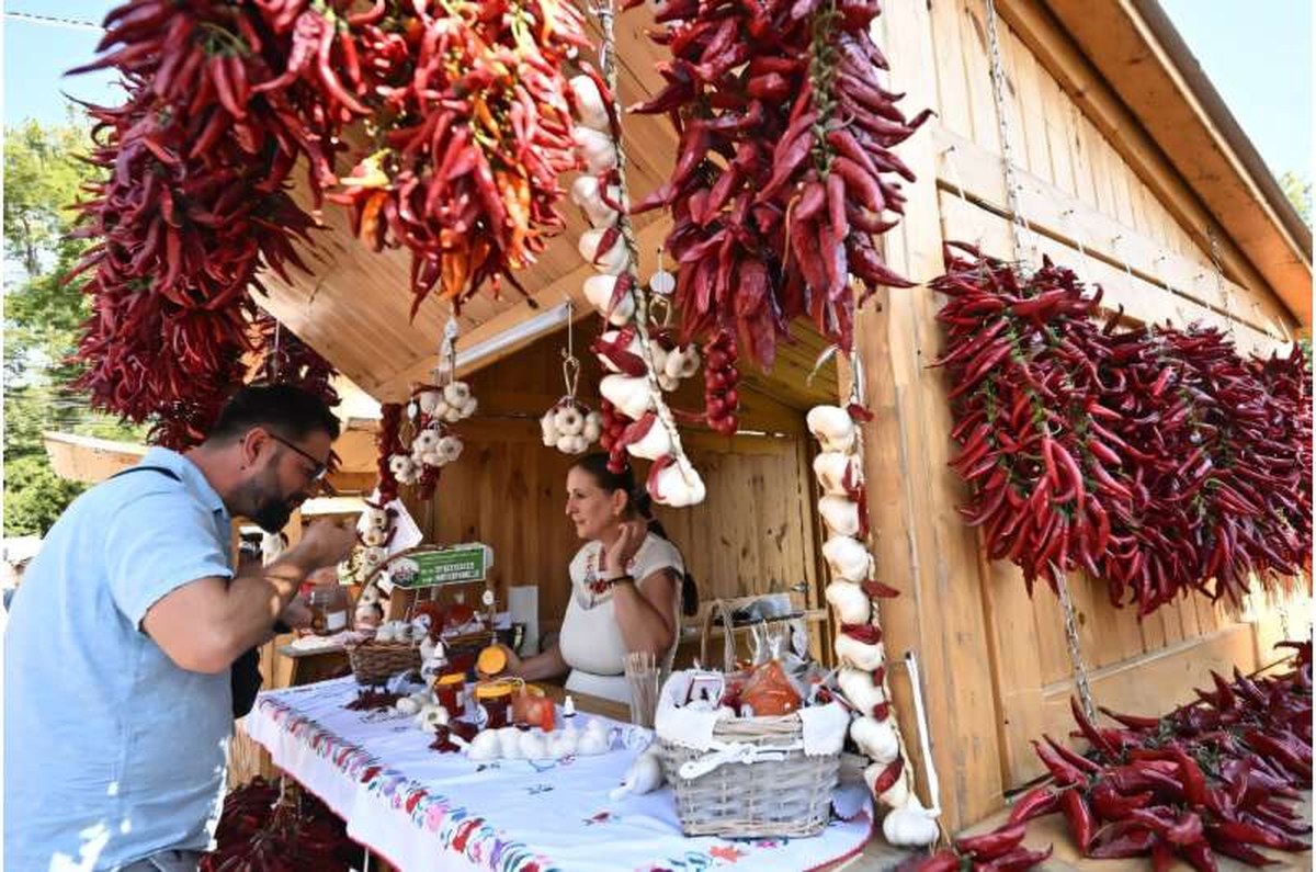 Nikoletta Pajsan Nagy sells paprika products at the annual town fair in Kalocsa. Nikoletta Pajsan Nagy sells paprika products at the annual town fair in Kalocsa
