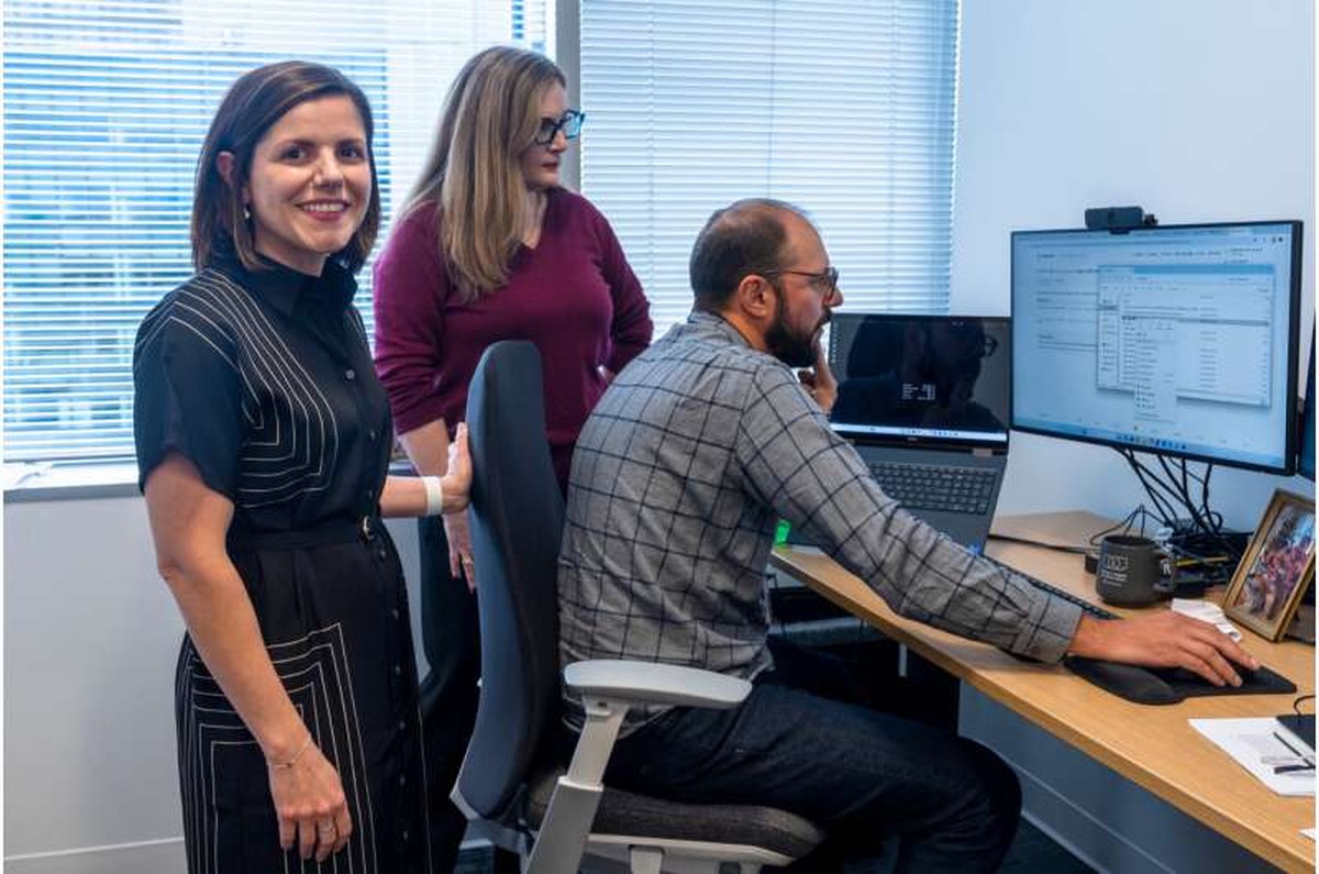 Smithsonian Institution's Chief Digital and Innovation Officer Becky Kobberod, from left, and her team Sara Snyder, director of Digital Experience and Data Scientist Mike Trizna, gather in Trizna's office Sept. 29, 2026, in Washington. Credit: AP Photo/Manuel Balce Ceneta How the Smithsonian is using AI to connect artifacts from the American Revolution