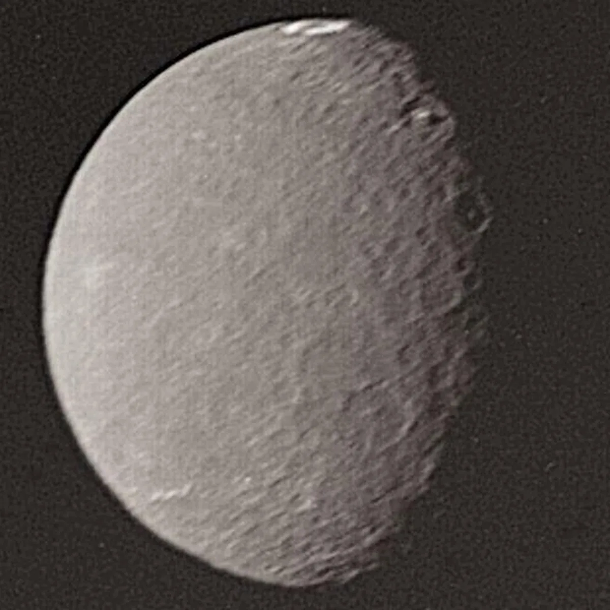 This image taken by Voyager 2 in 1986 shows Umbriel, one of the two moons of Uranus that Lassell discovered. This image taken by Voyager 2 in 1986 shows Umbriel, one of the two moons of Uranus that Lassell discovered.