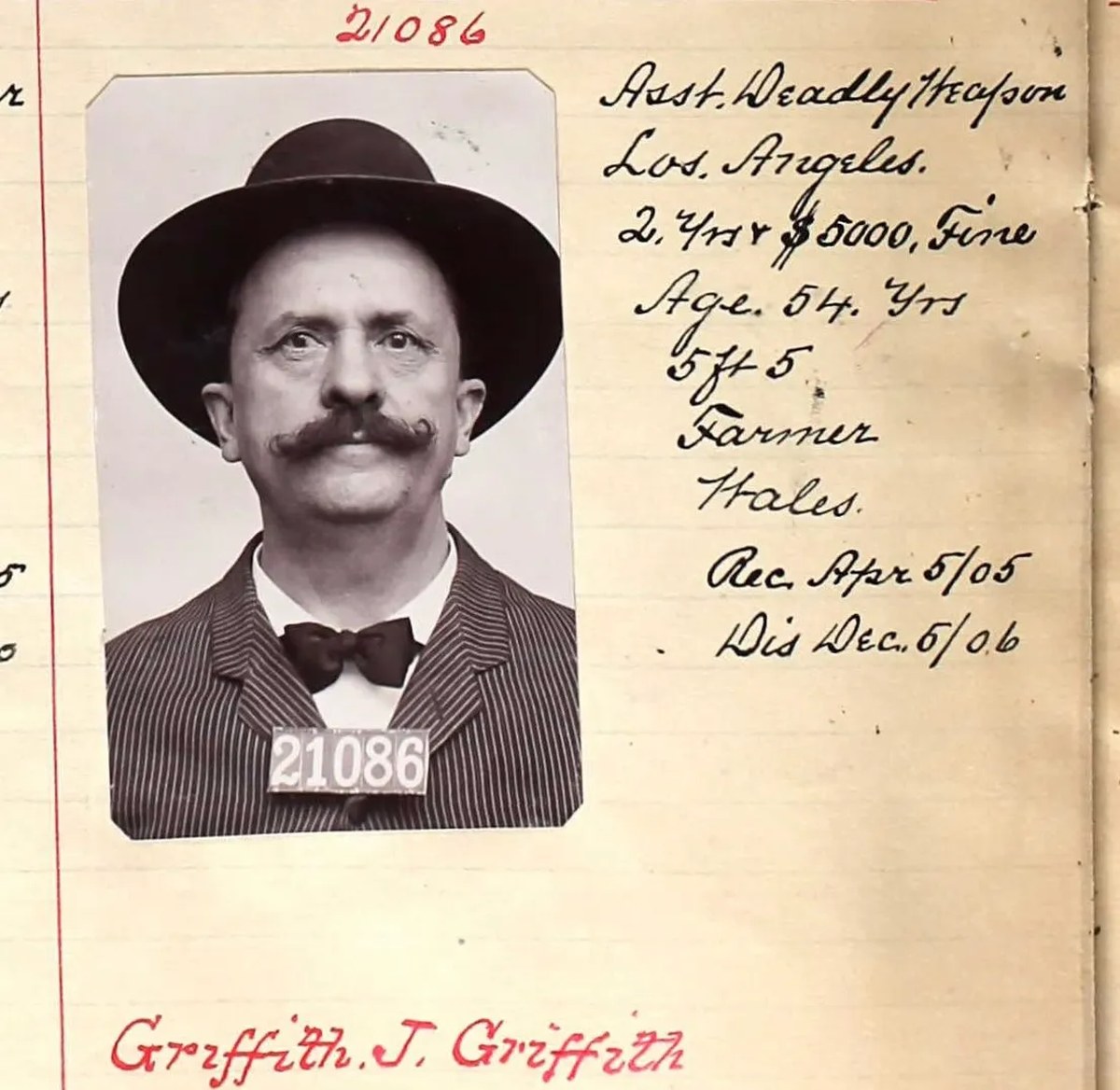 Mugshot of white man with mustache.