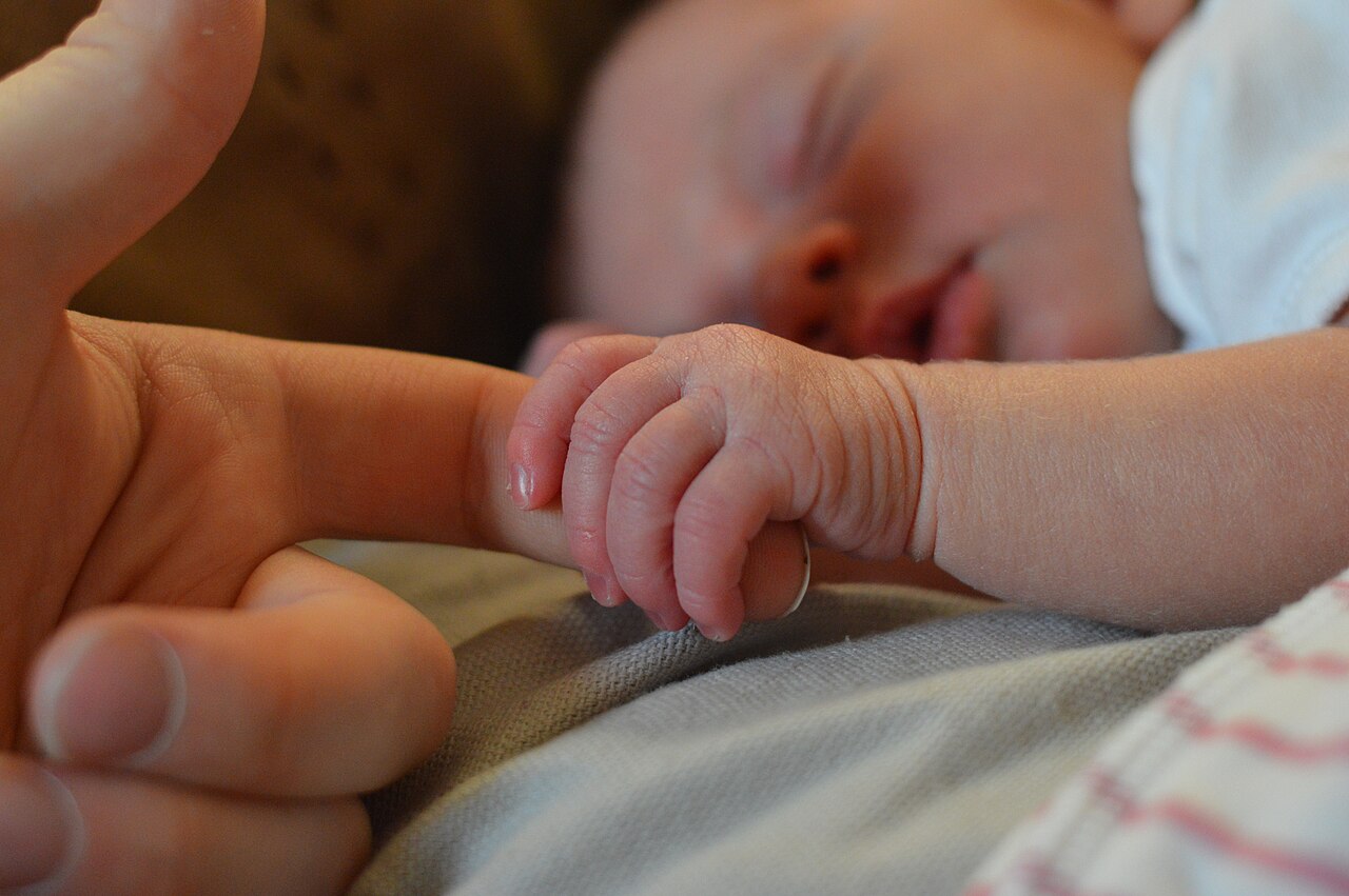 An adult and infant